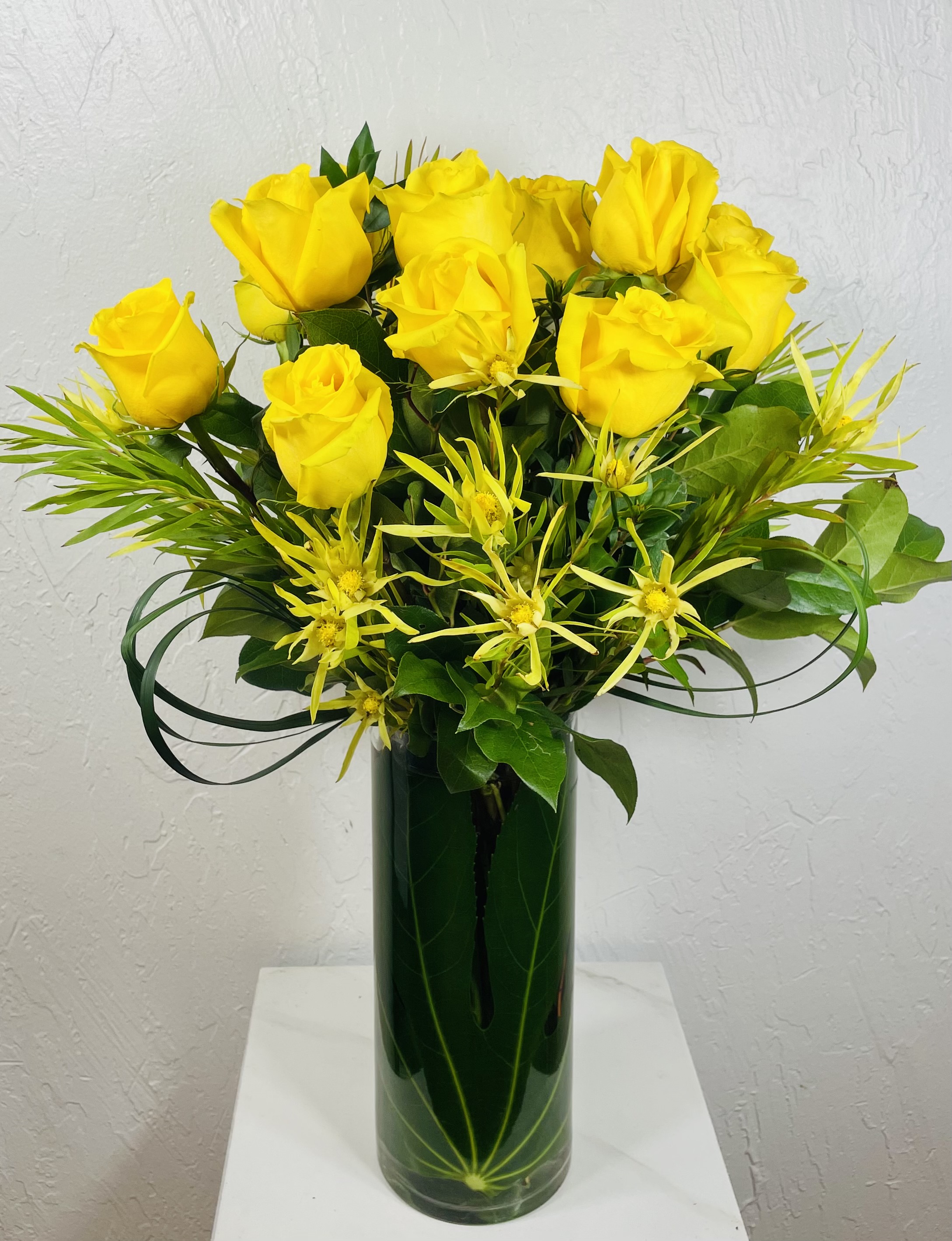 Yellow roses with yellow filler designed by La Paloma Blanca Floral Designs in Scottsdale, AZ