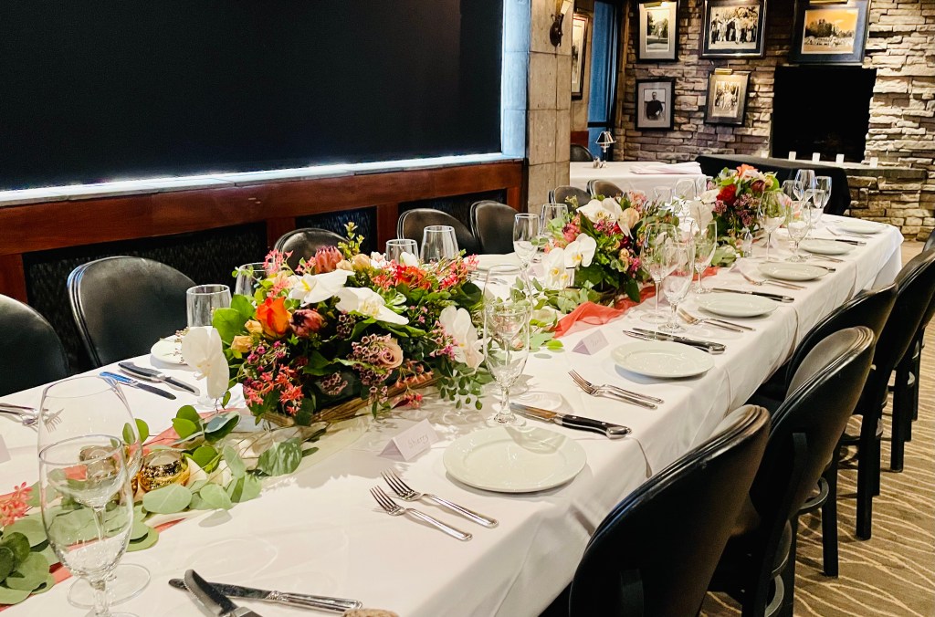 Tablescape with 3 arrangements and place settings